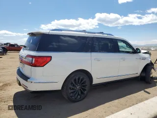 2020 Lincoln Navigator Reserve z VIN 5LMJJ3LT4LEL21810, wystawiony jako Copart lot #57626325 z przebiegiem 72 058 mil mil oraz Szkoda całkowita • Salvage title. Historia ofert i sprzedaży dostępna na DreamBid. Obrazek 3.