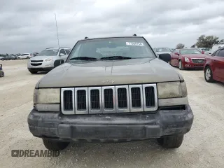 1998 Jeep Grand Cherokee Laredo with VIN 1J4GZ58S6WC137968, listed as a Copart auction lot 84083454 with 0 mi miles and Non Repairable. Bid and sale history available at carsss.com. Image 5.
