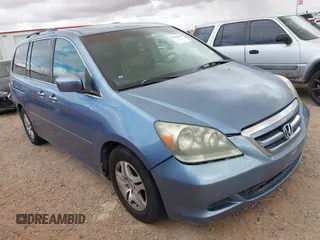 2006 Honda Odyssey EX-L z VIN 5FNRL38786B051497, wystawiony jako IAAI lot #42632868 z przebiegiem 209 037 mil mil oraz . Historia ofert i sprzedaży dostępna na DreamBid. Obrazek 1.