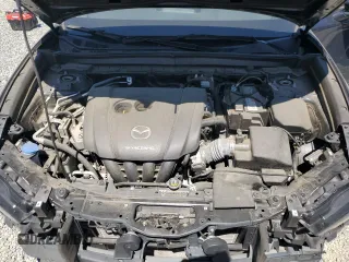 2021 Mazda CX-30 Select z VIN 3MVDMABL2MM232281, wystawiony jako Copart lot #51098235 z przebiegiem 46 052 mil mil oraz Nie do naprawy • Non repairable. Historia ofert i sprzedaży dostępna na DreamBid. Obrazek 11.