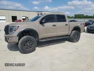 2021 Nissan Titan Pro-4X z VIN 1N6AA1ED5MN523913, wystawiony jako Copart lot #56371695 z przebiegiem 36 785 mil mil oraz Szkoda całkowita • Salvage title. Historia ofert i sprzedaży dostępna na DreamBid. Obrazek 1.