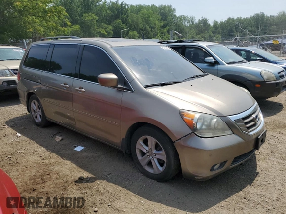 2008 Honda Odyssey Touring z VIN 5FNRL38968B025520, wystawiony jako Copart lot #60799645 z przebiegiem 116 592 mil mil oraz Szkoda całkowita • Salvage title. Historia ofert i sprzedaży dostępna na DreamBid. Obrazek 4.