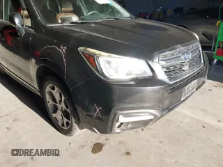 2017 Subaru Forester Touring z VIN JF2SJAWC8HH470269, wystawiony jako IAAI lot #41950347 z przebiegiem 135 189 mil mil oraz . Historia ofert i sprzedaży dostępna na DreamBid. Obrazek 21.