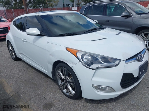 2015 Hyundai Veloster with VIN KMHTC6AD5FU231224, listed as a IAAI auction lot 41944186 with 103,124 mi miles. Bid and sale history available at carsss.com. Image 6.