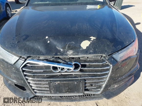 2017 Audi A6 Premium z VIN WAUF8AFC5HN061978, wystawiony jako IAAI lot #41424637 z przebiegiem 168 434 mil mil oraz . Historia ofert i sprzedaży dostępna na DreamBid. Obrazek 6.