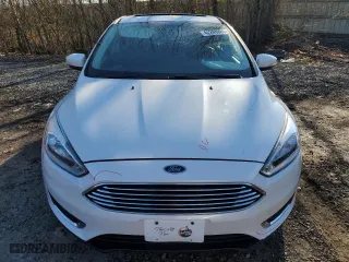2015 Ford Focus Titanium with VIN 1FADP3N25FL325037, listed as a Copart auction lot 42248985 with 58,831 mi miles and Salvage Title. Bid and sale history available at carsss.com. Image 5.