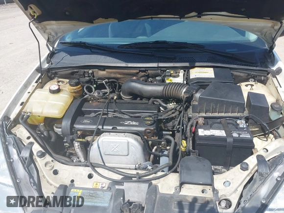2001 Ford Focus ZX3 z VIN 3FAFP31381R210045, wystawiony jako IAAI lot #41912083 z przebiegiem 52 931 mil mil oraz . Historia ofert i sprzedaży dostępna na DreamBid. Obrazek 10.