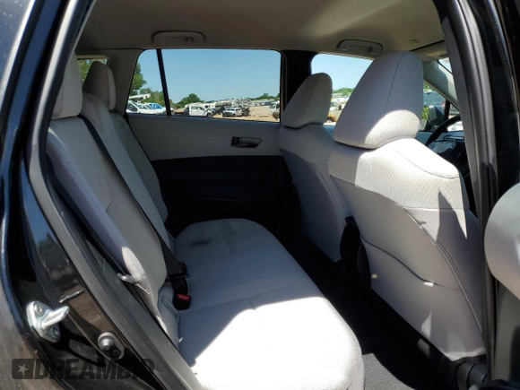 2023 Toyota Corolla Cross LE with VIN 7MUCAAAG3PV058094, listed as a Copart auction lot 57983105 with 30,593 mi miles and Salvage title. Bid and sale history available at DreamBid. Image 11.
