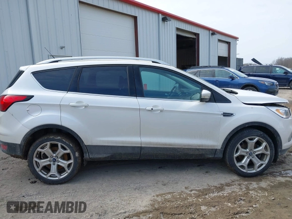 2019 Ford Escape Titanium with VIN 1FMCU9J97KUB85528, listed as a IAAI auction lot 41708344 with 88,841 mi miles. Bid and sale history available at carsss.com. Image 13.
