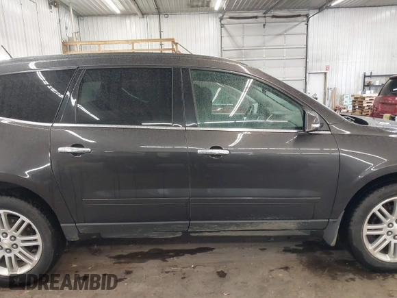 2015 Chevrolet Traverse LT with VIN 1GNKVGKD5FJ296064, listed as a IAAI auction lot 42581755 with 162,297 mi miles and . Bid and sale history available at DreamBid. Image 14.