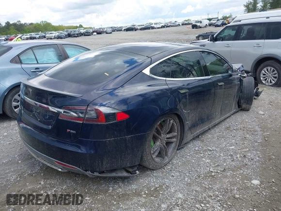 2014 Tesla Model S 60 with VIN 5YJSA1H15EFP43884, listed as a IAAI auction lot 41993180 with 78,305 mi miles and . Bid and sale history available at DreamBid. Image 4.