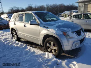 2010 Suzuki Grand Vitara Premium with VIN JS3TD0D24A4100420, listed as a Copart auction lot 87454774 with 113,624 mi miles and Salvage Title. Bid and sale history available at carsss.com. Image 4.
