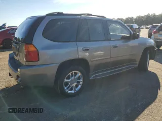 2006 GMC Envoy Denali with VIN 1GKES63M962257466, listed as a Copart auction lot 76821124 with 171,266 mi miles and Salvage Title. Bid and sale history available at carsss.com. Image 3.