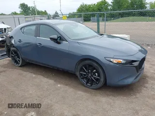 2023 Mazda 3 S Preferred z VIN JM1BPALM9P1623663, wystawiony jako IAAI lot #42341379 z przebiegiem 31 848 mil mil oraz . Historia ofert i sprzedaży dostępna na DreamBid. Obrazek 1.