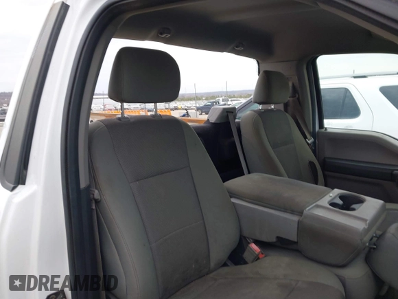 2018 Ford F-150 XL with VIN 1FTNF1E53JKC23766, listed as a IAAI auction lot 41149145 with 301,176 mi miles and . Bid and sale history available at DreamBid. Image 8.