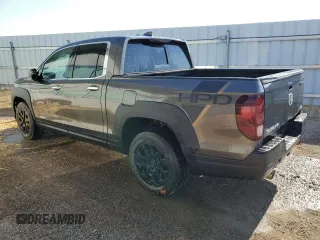 2022 Honda Ridgeline RTL-E with VIN 5FPYK3F79NB037874, listed as a Copart auction lot 65616285 with 39,856 mi miles and Clean title. Bid and sale history available at DreamBid. Image 2.