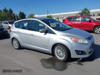 2013 Ford C-Max Hybrid SEL with VIN 1FADP5BU7DL502718, listed as a IAAI auction lot 42087598 with 185,461 mi miles. Bid and sale history available at carsss.com. Image 1.