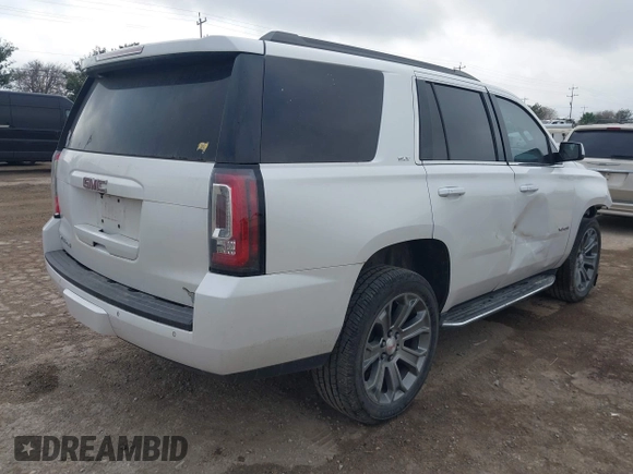 2019 GMC Yukon SLT with VIN 1GKS1BKCXKR329607, listed as a IAAI auction lot 41188239 with 84,940 mi miles. Bid and sale history available at carsss.com. Image 4.