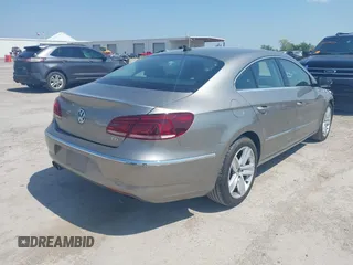 2013 Volkswagen CC Sport with VIN WVWBN7AN2DE555375, listed as a IAAI auction lot 42048643 with 125,484 mi miles and . Bid and sale history available at DreamBid. Image 4.