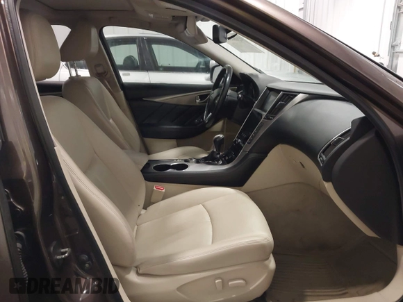 2015 Infiniti Q50 Premium z VIN JN1BV7ARXFM418280, wystawiony jako IAAI lot #42080879 z przebiegiem 126 411 mil mil oraz . Historia ofert i sprzedaży dostępna na DreamBid. Obrazek 5.