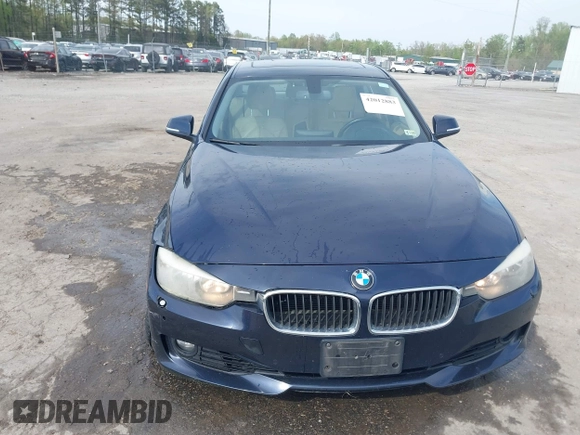 2013 BMW 3 Series 328i xDrive with VIN WBA3B5G53DNS02293, listed as a IAAI auction lot 42012883 with 243,490 mi miles. Bid and sale history available at carsss.com. Image 12.