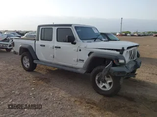 2020 Jeep Gladiator Sport S with VIN 1C6HJTAG5LL141251, listed as a IAAI auction lot 41825062 with 51,961 mi miles and . Bid and sale history available at DreamBid. Image 1.