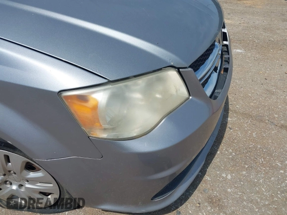 2014 Dodge Grand Caravan SXT z VIN 2C4RDGCG3ER128971, wystawiony jako IAAI lot #41921386 z przebiegiem 255 074 mil mil oraz . Historia ofert i sprzedaży dostępna na DreamBid. Obrazek 13.