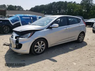 2012 Hyundai Accent SE with VIN KMHCU5AE7CU011434, listed as a Copart auction lot 60606055 with 76,086 mi miles and Salvage title. Bid and sale history available at DreamBid. Image 1.