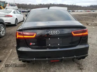 2016 Audi S6 Premium Plus z VIN WAUF2AFC5GN021402, wystawiony jako Copart lot #67612222 z przebiegiem 66 856 mil mil oraz . Historia ofert i sprzedaży dostępna na DreamBid. Obrazek 6.