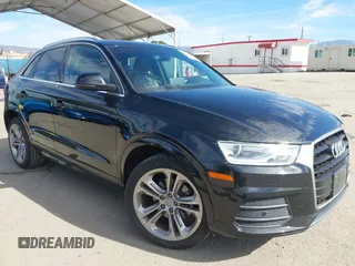 2017 Audi Q3 Premium Plus z VIN WA1HCCFS7HR001054, wystawiony jako IAAI lot #41583344 z przebiegiem 79 330 mil mil oraz . Historia ofert i sprzedaży dostępna na DreamBid. Obrazek 1.