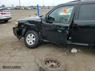 2010 Mercury Mariner with VIN 4M2CN8BG5AKJ00599, listed as a Copart auction lot 79773304 with 48,482 mi miles and Non Repairable. Bid and sale history available at carsss.com. Image 11.