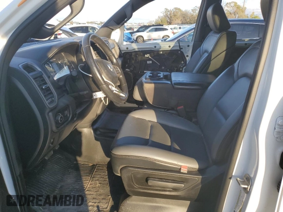 2023 Ram 1500 Tradesman with VIN 1C6RRFCG2PN631569, listed as a Copart auction lot 81765424 with 23,811 mi miles and Salvage title. Bid and sale history available at DreamBid. Image 7.