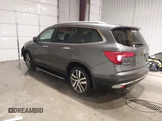 2017 Honda Pilot Touring with VIN 5FNYF6H91HB084737, listed as a IAAI auction lot 41608145 with 86,696 mi miles. Bid and sale history available at carsss.com. Image 3.