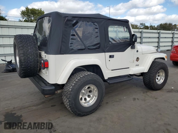 1999 Jeep Wrangler Sahara with VIN 1J4FY49SXXP414414, listed as a Copart auction lot 41643665 with 154,810 mi miles and Salvage Title. Bid and sale history available at carsss.com. Image 3.