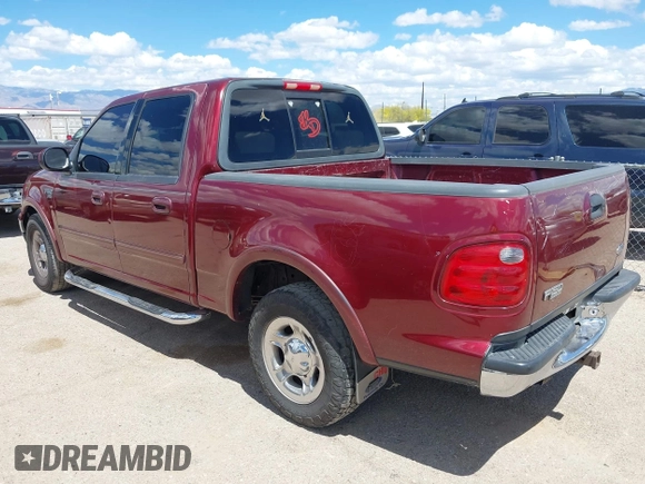 2003 Ford F-150 XLT with VIN 1FTRW07693KC11903, listed as a IAAI auction lot 41993455 with 301,023 mi miles. Bid and sale history available at carsss.com. Image 3.