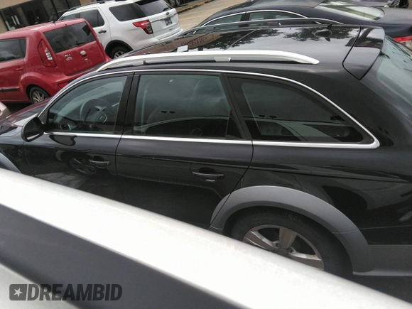 2013 Audi allroad A4 Premium z VIN WA19FAFL9DA220535, wystawiony jako IAAI lot #42367654 z przebiegiem 174 896 mil mil oraz . Historia ofert i sprzedaży dostępna na DreamBid. Obrazek 14.