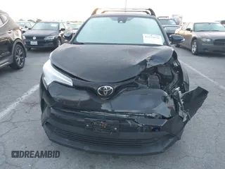 2019 Toyota C-HR XLE with VIN JTNKHMBXXK1034717, listed as a IAAI auction lot 41939078 with 56,309 mi miles. Bid and sale history available at carsss.com. Image 13.