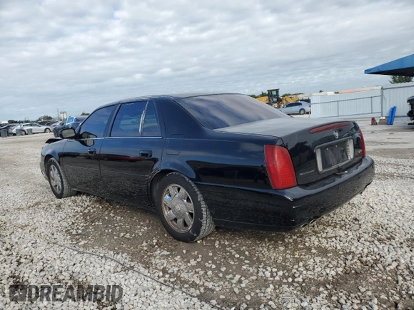 2002 Cadillac DeVille DTS with VIN 1G6KF57962U233811, listed as a Copart auction lot 80435034 with 62,005 mi miles and Salvage Title. Bid and sale history available at carsss.com. Image 2.