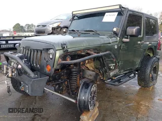 2009 Jeep Wrangler Rubicon z VIN 1J8GA64169L743008, wystawiony jako IAAI lot #41792451 z przebiegiem 142 414 mil mil oraz . Historia ofert i sprzedaży dostępna na DreamBid. Obrazek 6.