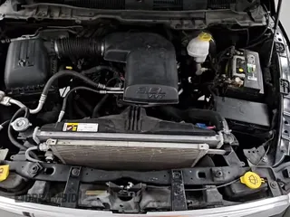 2019 Ram 1500 Tradesman z VIN 1C6RR6FG4KS610289, wystawiony jako Copart lot #80401815 z przebiegiem 144 108 mil mil oraz Czysty tytuł • Clean title. Historia ofert i sprzedaży dostępna na DreamBid. Obrazek 13.