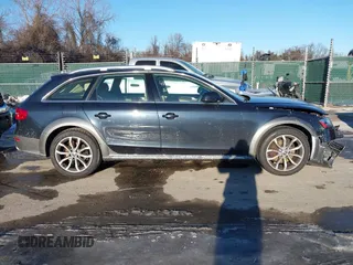 2013 Audi allroad Premium Plus with VIN WA1UFAFL4DA098600, listed as a IAAI auction lot 41329606 with 107,847 mi miles. Bid and sale history available at carsss.com. Image 13.