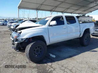 2010 Toyota Tacoma PreRunner with VIN 3TMJU4GN7AM093616, listed as a IAAI auction lot 41861992 with 257,406 mi miles and . Bid and sale history available at DreamBid. Image 2.