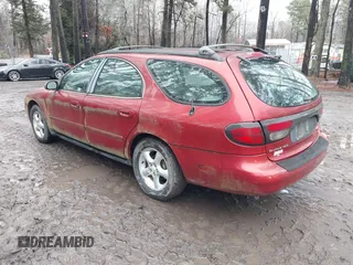 2001 Ford Taurus SE Standard with VIN 1FAFP58U91A290623, listed as a IAAI auction lot 41503243 with 117,194 mi miles and . Bid and sale history available at DreamBid. Image 3.