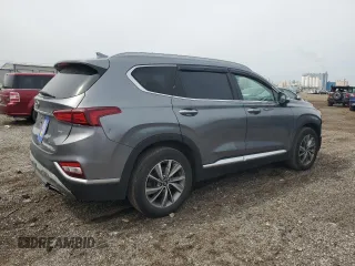 2019 Hyundai Santa Fe Ultimate z VIN 5NMS5CAD7KH001629, wystawiony jako Copart lot #50974415 z przebiegiem 197 585 mil mil oraz Szkoda całkowita • Salvage title. Historia ofert i sprzedaży dostępna na DreamBid. Obrazek 3.