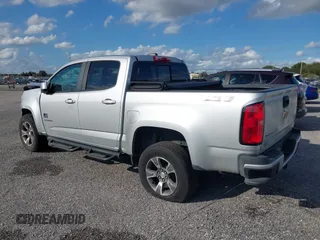 2019 Chevrolet Colorado 2WD Z71 with VIN 1GCGSDEN6K1330906, listed as a IAAI auction lot 40058453 with 116,053 mi miles. Bid and sale history available at carsss.com. Image 3.