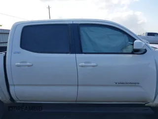 2017 Toyota Tacoma SR5 with VIN 5TFAZ5CN8HX043633, listed as a IAAI auction lot 41520703 with 104,711 mi miles and . Bid and sale history available at DreamBid. Image 13.