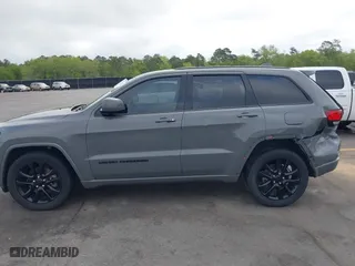 2021 Jeep Grand Cherokee Laredo X with VIN 1C4RJEAG4MC597302, listed as a IAAI auction lot 41919123 with 63,849 mi miles. Bid and sale history available at carsss.com. Image 14.