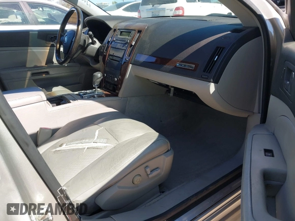 2005 Cadillac STS z VIN 1G6DW677350224198, wystawiony jako IAAI lot #42321639 z przebiegiem 122 208 mil mil oraz . Historia ofert i sprzedaży dostępna na DreamBid. Obrazek 5.