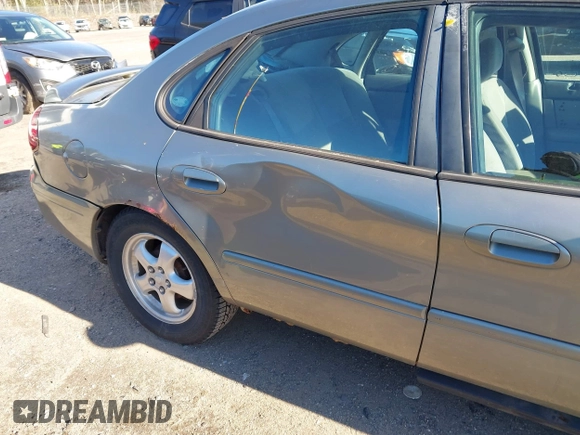 2004 Ford Taurus SE with VIN 1FAFP53224G197451, listed as a IAAI auction lot 41224109 with 290,224 mi miles and . Bid and sale history available at DreamBid. Image 12.