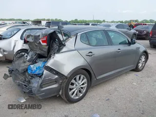 2015 Kia Optima EX with VIN 5XXGN4A70FG442402, listed as a IAAI auction lot 42260968 with 94,512 mi miles and . Bid and sale history available at DreamBid. Image 4.